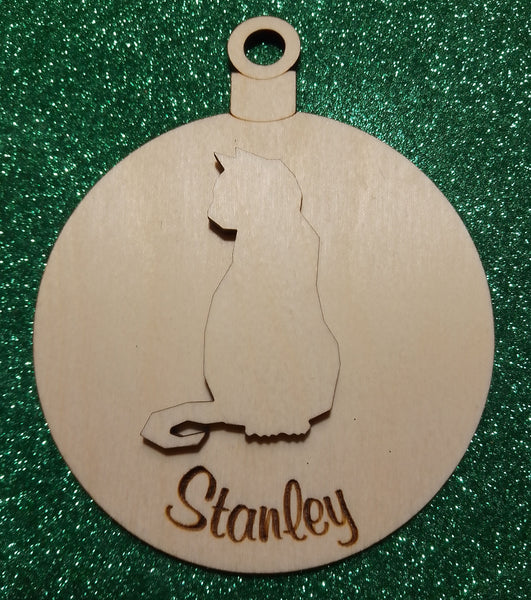 Pet bauble with cat or dog and personalised with one name