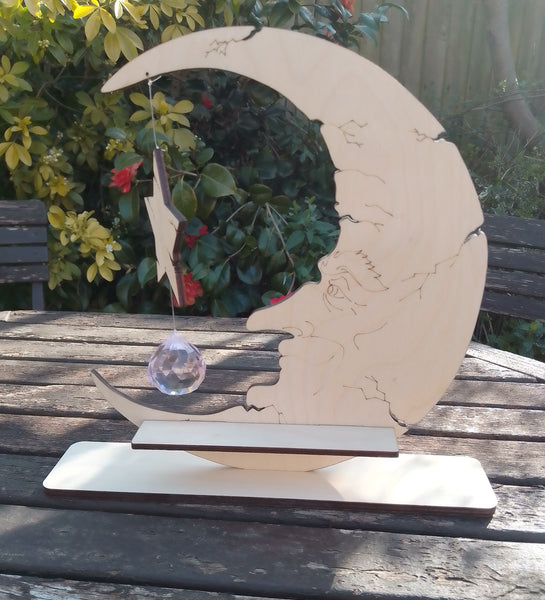 Stoney Moon Shelf on a stand with star and crystal