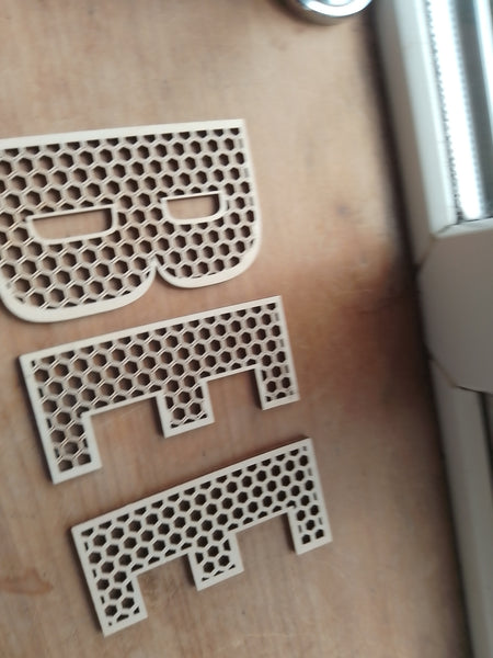 Honeycomb letters in various sizes