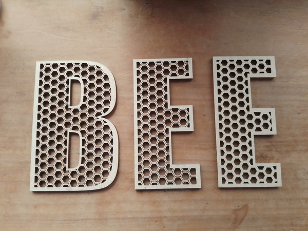 Honeycomb letters in various sizes