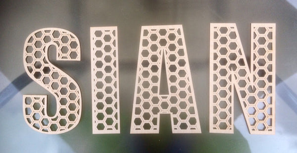 Honeycomb letters in various sizes